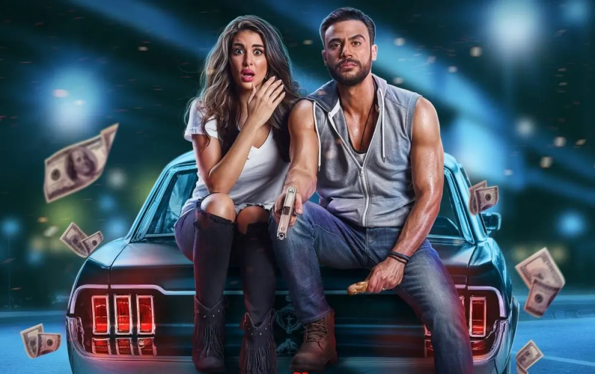 محمد إمام وياسمين صبري - الصورة من صفحته الرسمية على الفيس بوك