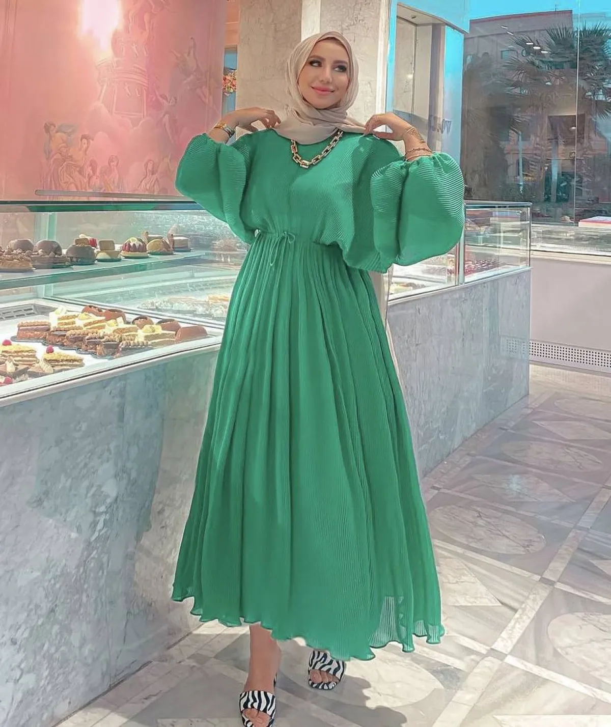 رهف الشامي بفستان اخضر منفوش