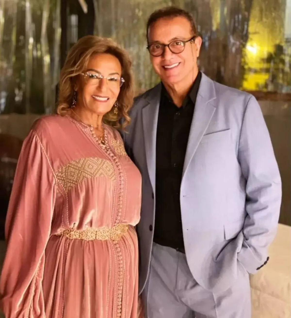 نزهة الراكراكي برفقة زوجها البشير عبده من حفل عقد قران نجلهما سعد لمجرد - صورة من صفحتها على انستغرام