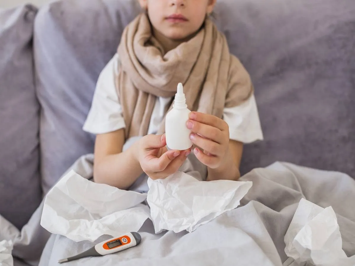 صورة لطفل مريض بالإنفلونزا