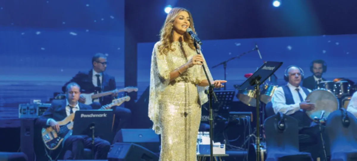 ألفة بن رمضان- الصورة من معرض الرياض الدولي للكتاب على توتير