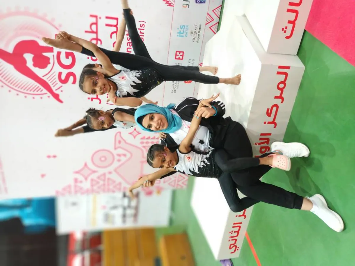 المدربة هناء السيد مع فريق مركز الرياض الفائز بالمرتبة الأولى 