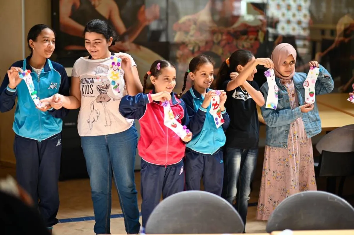 تفاعل الأطفال مع قصة جوارب أمي العجيبة. الصورة من "وام"