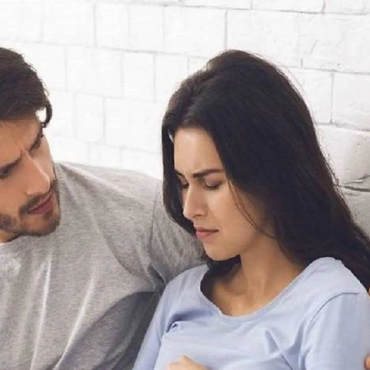 صورة لأم يدعمها زوجها