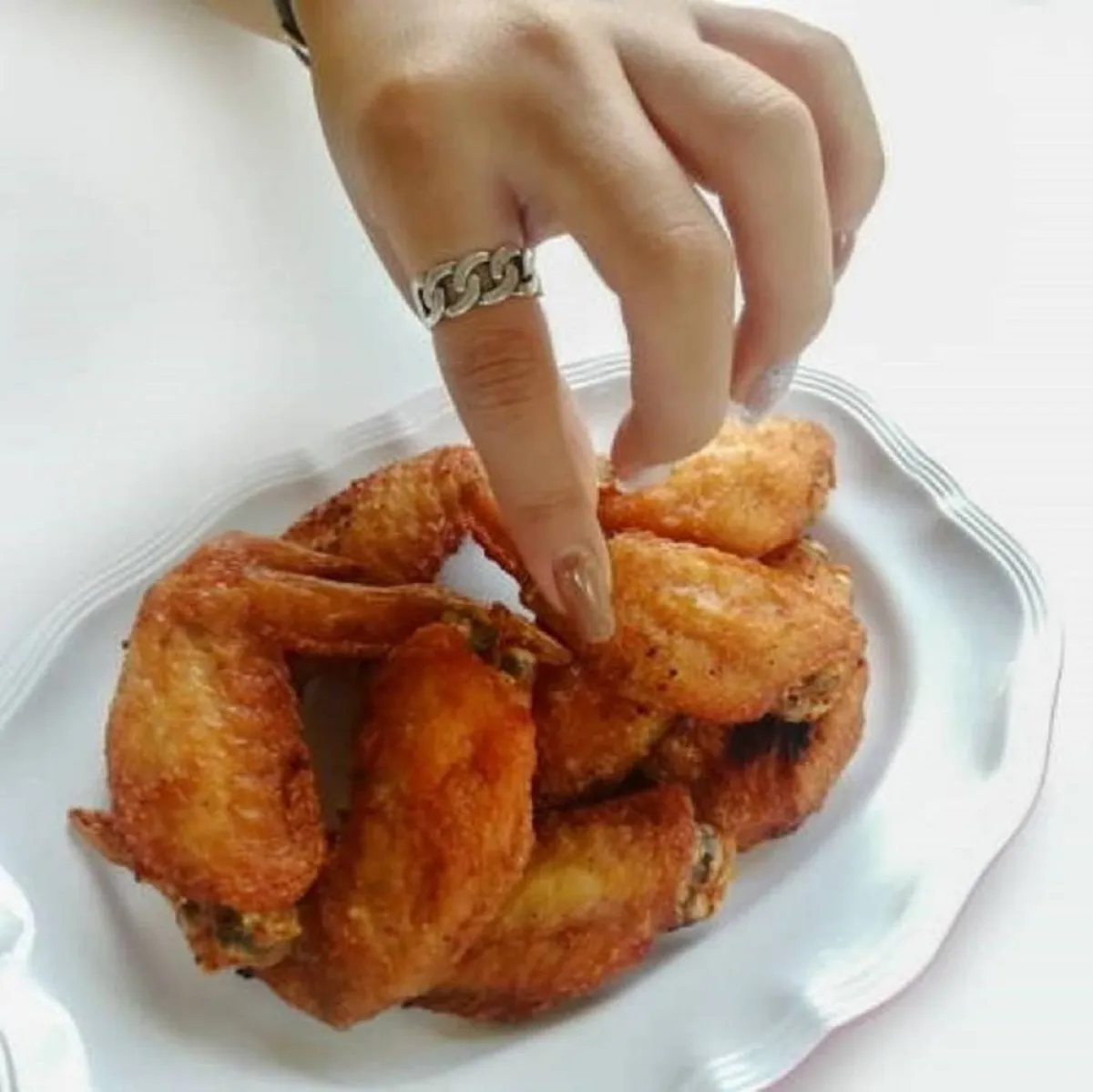 صورة لدجاج متبل ودهني