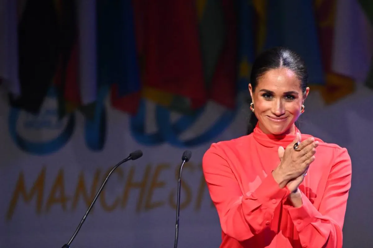 Britain's Meghan, Duchess of Sussex applauds at the end of her speech on stage during the annual One Young World Summit at Bridgewater Hall in Manchester, north-west England on September 5, 2022.  Oli SCARFF / AFP