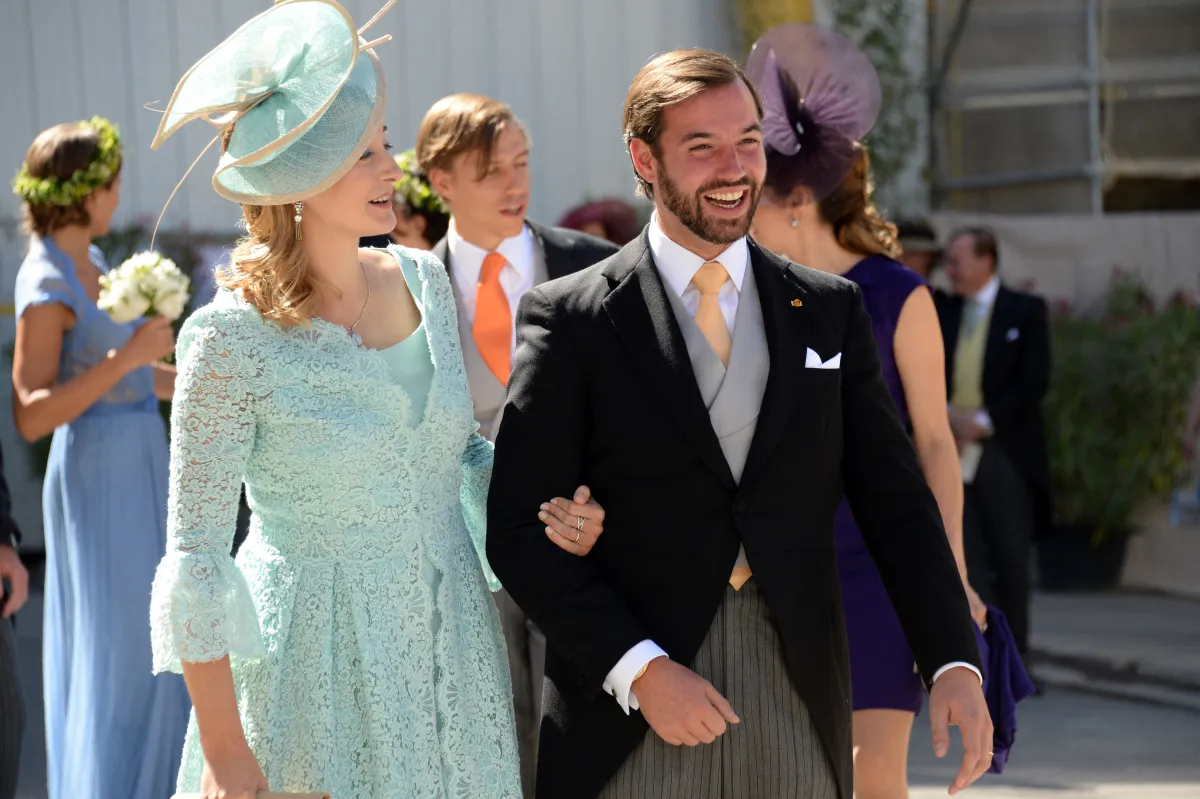 Princess Stephanie of Luxembourg and Prince Guillaume of Luxembourg pose for photographers after the Wedding Ceremony of Prince Felix of Luxembourg with German student Claire Lademacher on September 21, 2013 at the Saint Mary Magdalene Basilica in Saint-Maximin-La-Sainte-Baume, southern France. ANNE-CHRISTINE POUJOULAT / AFP