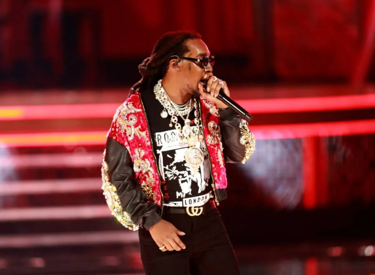  FILES) In this file photo taken on June 24, 2018, US rapper Takeoff, of Migos, performs onstage at the 2018 BET Awards at Microsoft Theater in Los Angeles, California. The rapper Takeoff, a member of the Grammy-nominated hip hop trio Migos, was fatally shot at a bowling alley in Houston, Texas, on November 1, 2022, according to entertainment outlet TMZ. He was 28 years old. Leon Bennett / GETTY IMAGES NORTH AMERICA / AFP