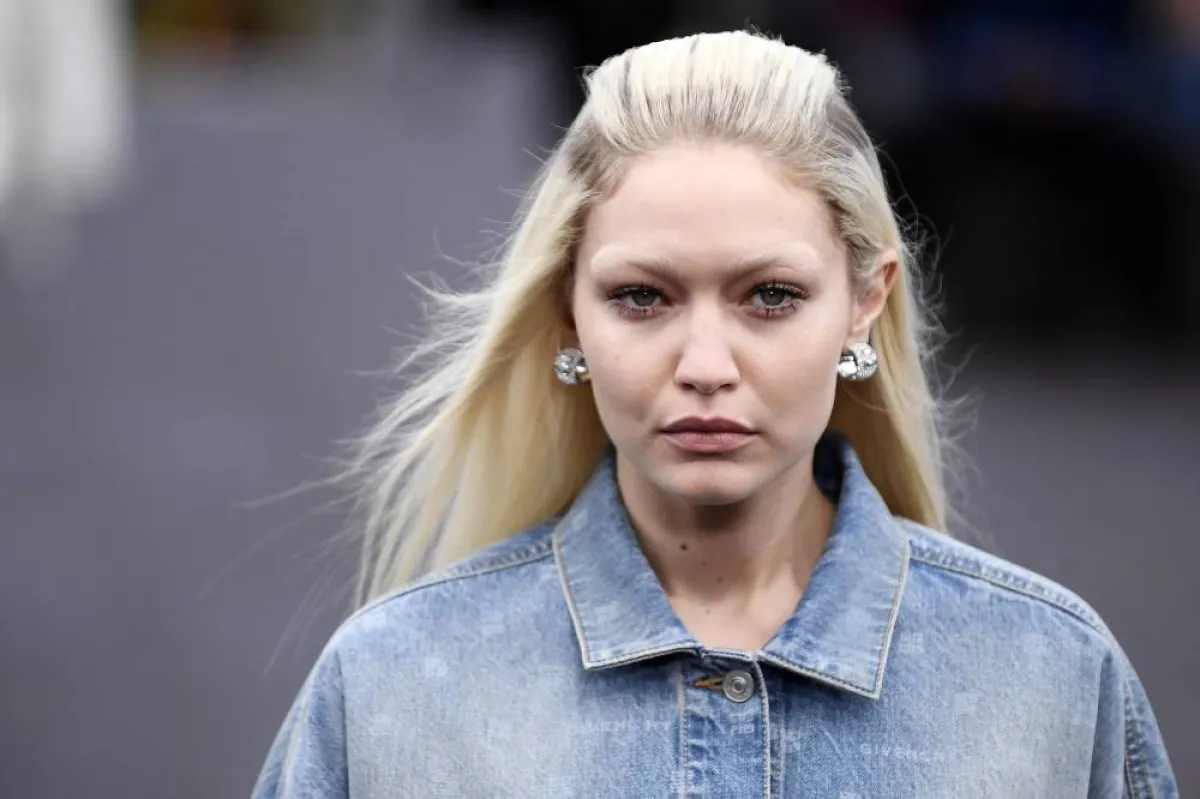 US model Gigi Hadid presents a creation for Givenchy during the Spring-Summer 2023 fashion show as part of the Paris Womenswear Fashion Week, in Paris, on October 2, 2022. JULIEN DE ROSA / AFP