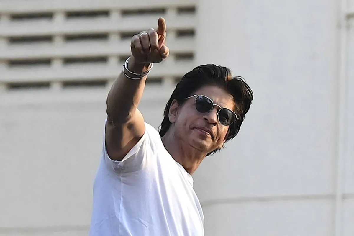 Bollywood actor Shah Rukh Khan greets fans during his birthday celebrations at his Mannat residence in Mumbai on November 2, 2022. Sujit JAISWAL / AFP