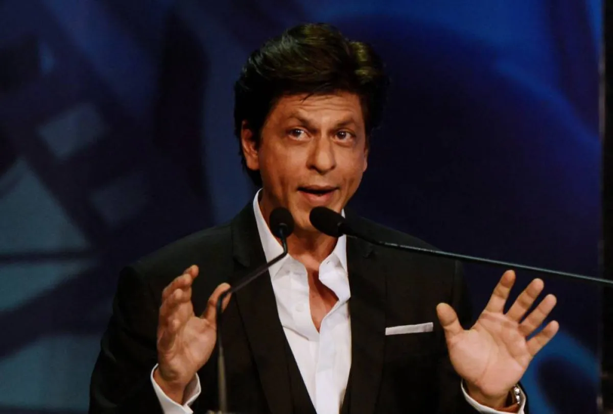 Indian Bollywood actor Shah Rukh Khan speaks during the inauguration of the 24th Kolkata International Film Festival in Kolkata on November 10, 2018. More than 320 films from 70 countries will be screened during the seven-day festival.Dibyangshu SARKAR / AFP