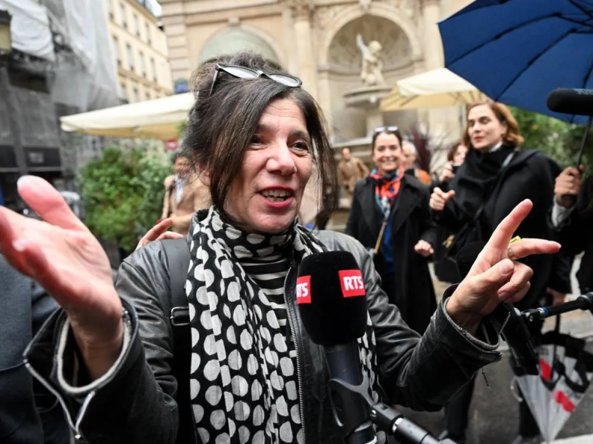 French writer Brigitte Giraud answers a journalist's questions