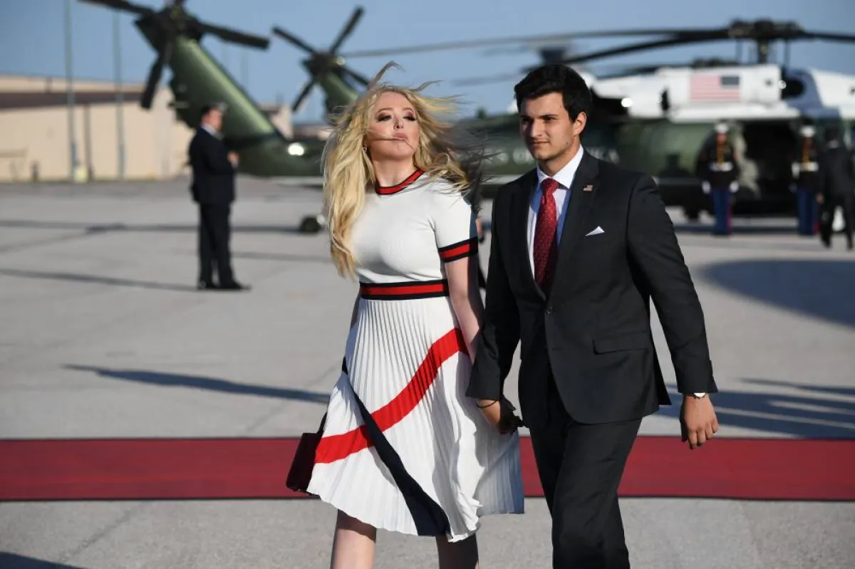Daughter of the US president Tiffany Trump (L) and boyfriend Michael Boulos arrive at Ellsworth Air Force Base in South Dakota, July 3, 2020, as they travel to view Independence Day fireworks at Mount Rushmore. SAUL LOEB / AFP
