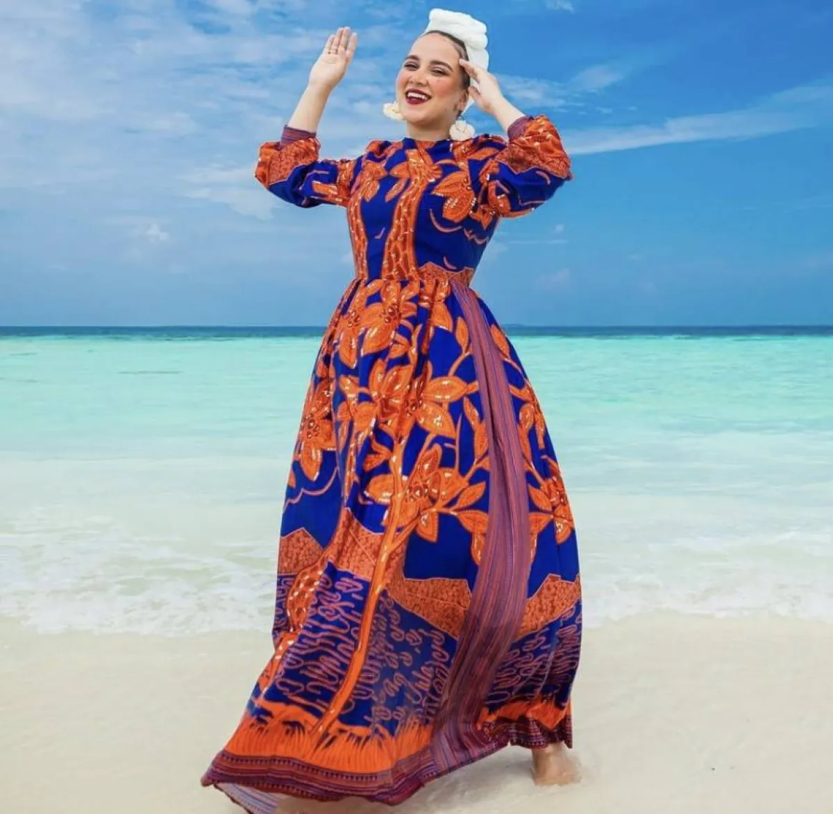 بطوطة نصر بفستان صيفي