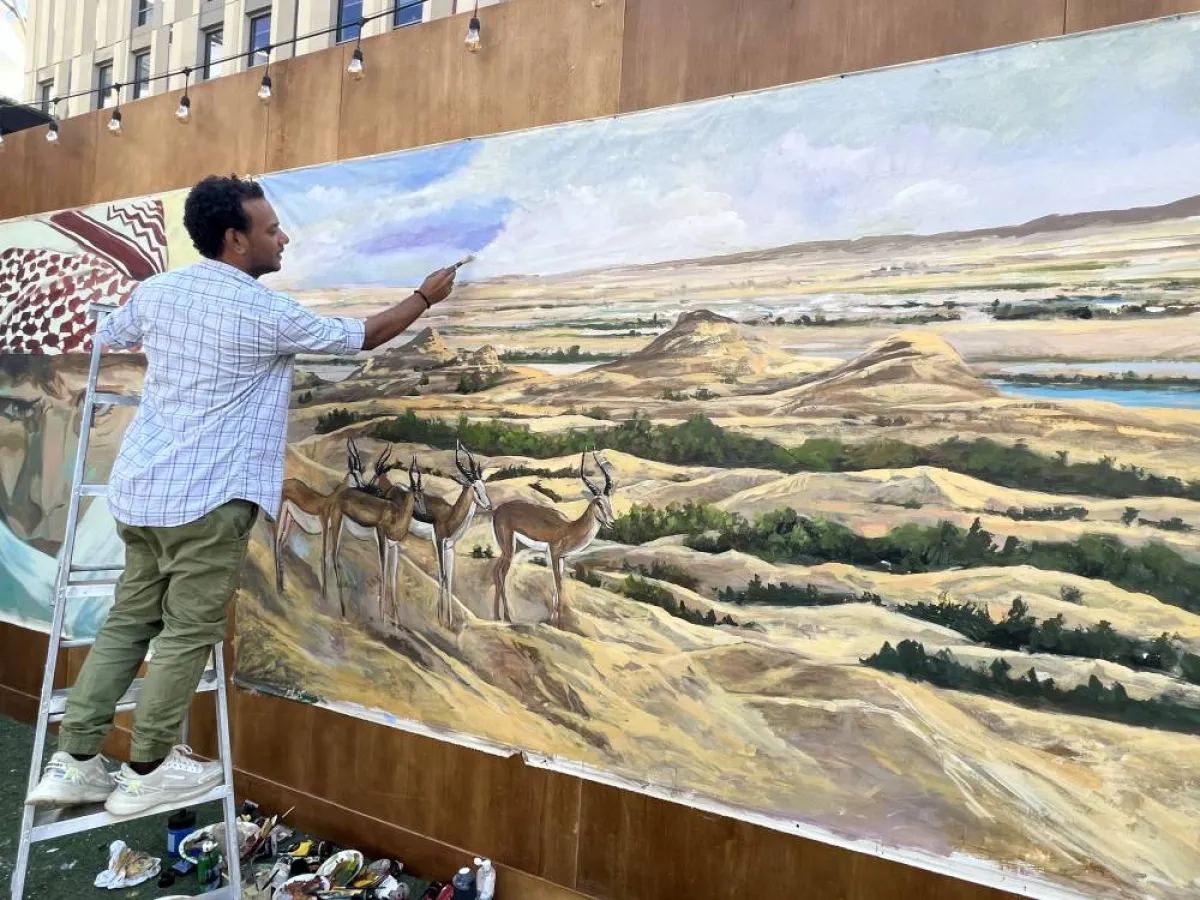 الرسام المصري عصران عبدالفتاح- جدارية جبل حافيت