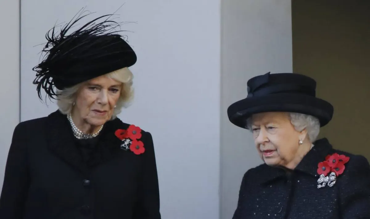 Britain's Queen Elizabeth II (R) talks with Britain's Camilla, Duchess of Cornwall (L) as they attend the Remembrance Sunday ceremony at the Cenotaph on Whitehall in central London, on November 10, 2019. Remembrance Sunday is an annual commemoration held on the closest Sunday to Armistice Day, November 11, the anniversary of the end of the First World War and services across Commonwealth countries remember servicemen and women who have fallen in the line of duty since WWI. Tolga AKMEN / AFP