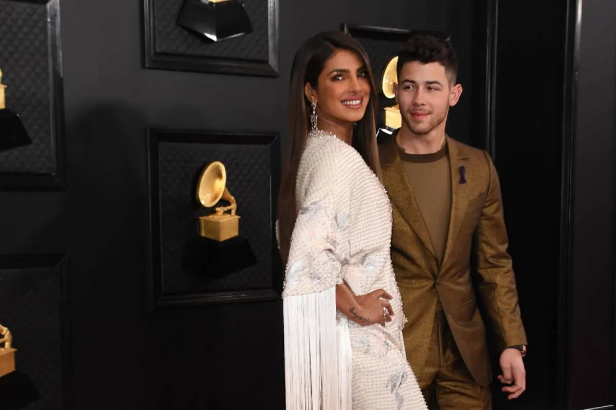 Indian actress Priyanka Chopra (L) and US singer-songwriter Nick Jonas arrive for the 62nd Annual Grammy Awards on January 26, 2020, in Los Angeles. VALERIE MACON / AFP