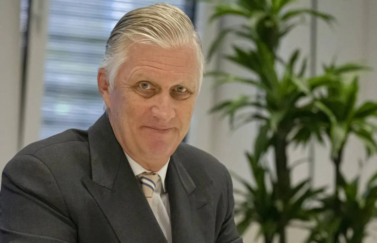 King Philippe of Belgium looks on during a visit at the BioNTeCH research institute in Mainz, Rhineland-Palatinate, western Germany, on October 5, 2022. ANDRE PAIN / AFP