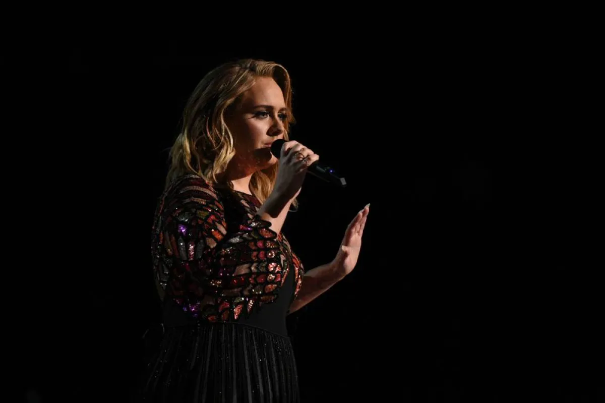 British singer Adele performs onstage during the 59th Annual Grammy music Awards on February 12, 2017, in Los Angeles, California. VALERIE MACON / AFP