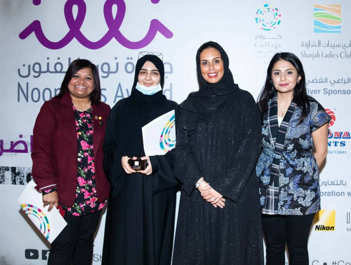 صورة مع إحدى الفائزات