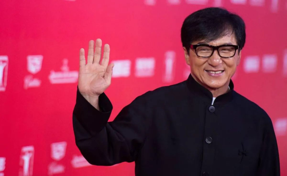 Hong Kong actor Jackie Chan poses on the red carpet during the opening ceremony of the Shanghai International Film Festival (SIFF) in Shanghai on June 13, 2015. The 18th Shanghai International Film Festival runs from June 13 to 21. AFP PHOTO / JOHANNES EISELE JOHANNES EISELE / AFP