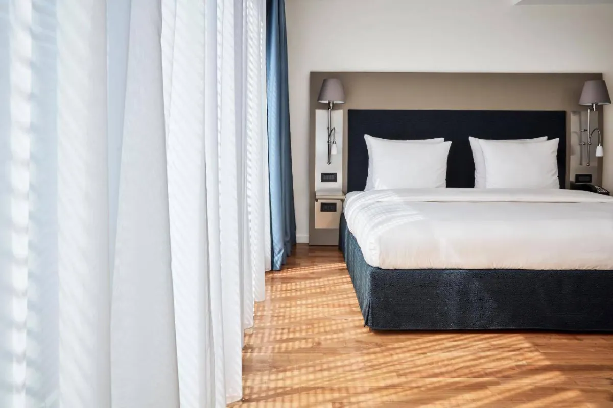 غرفة في فندق "ذا ماندالا"