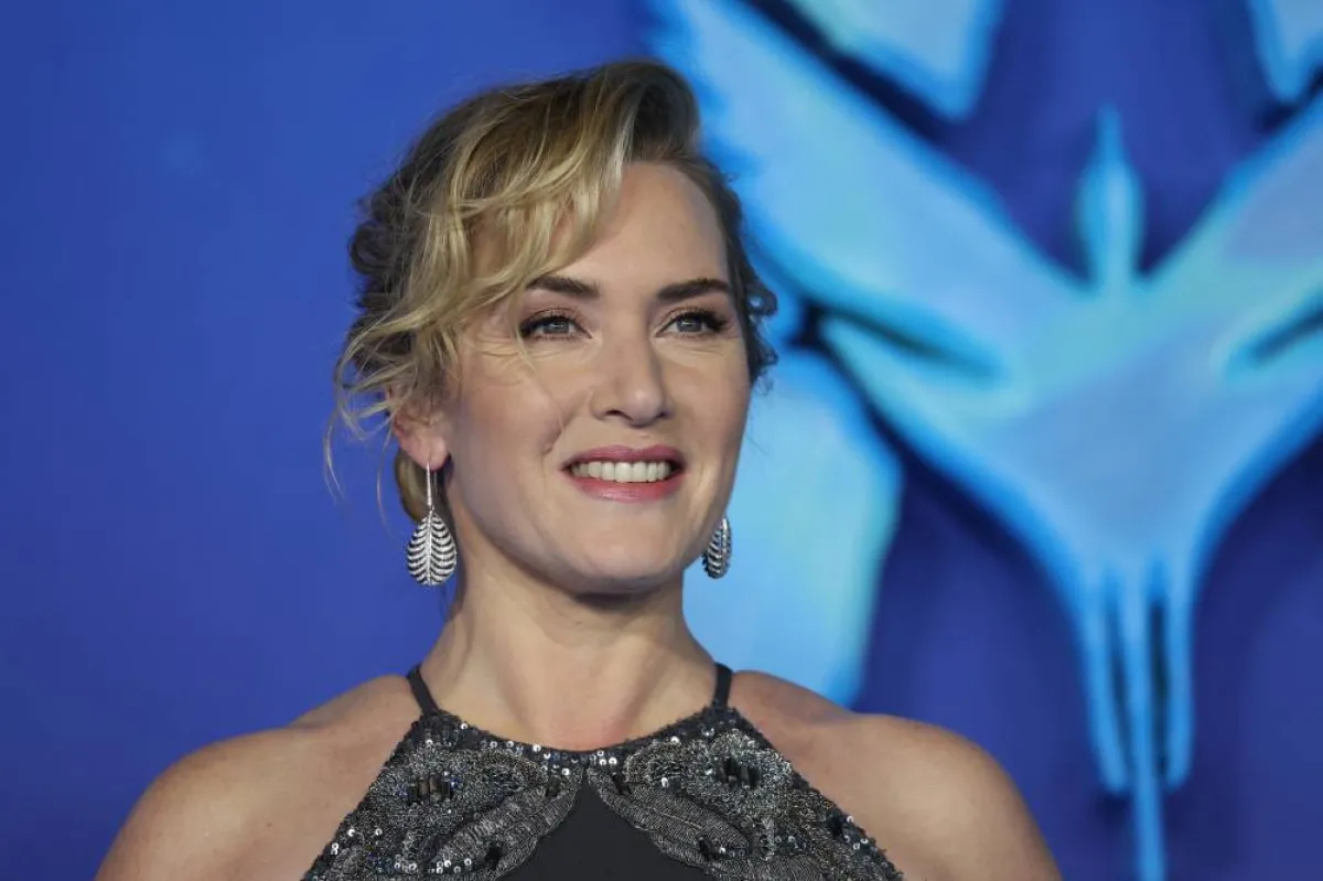 British actress Kate Winslet poses on the red carpet upon arrival for the World Premiere of the film "Avatar: The Way of Water" in London on December 6, 2022. ISABEL INFANTES / AFP