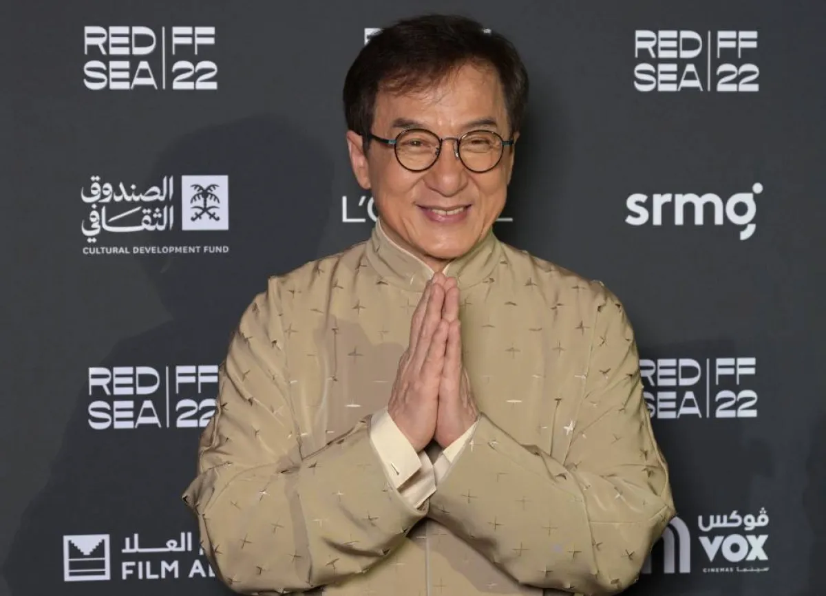 Actor Jackie Chan poses on the Red Carpet during the closing ceremony of the second edition of the Red Sea International Film Festival (RSIFF), in Jeddah, Saudi Arabia, on December 8, 2022. AMMAR ABD RABBO / Red Sea Film Festival