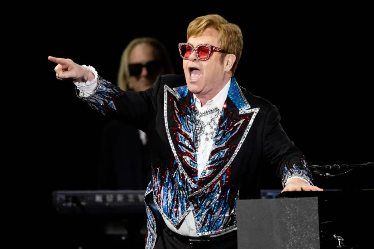 LOS ANGELES, CALIFORNIA - NOVEMBER 17: Musician Sir Elton John performs onstage during the Farewell Yellow Brick Road tour at Dodger Stadium on November 17, 2022 in Los Angeles, California. Scott Dudelson/Getty Images/AFP Scott Dudelson / GETTY IMAGES NORTH AMERICA / Getty Images via AFP