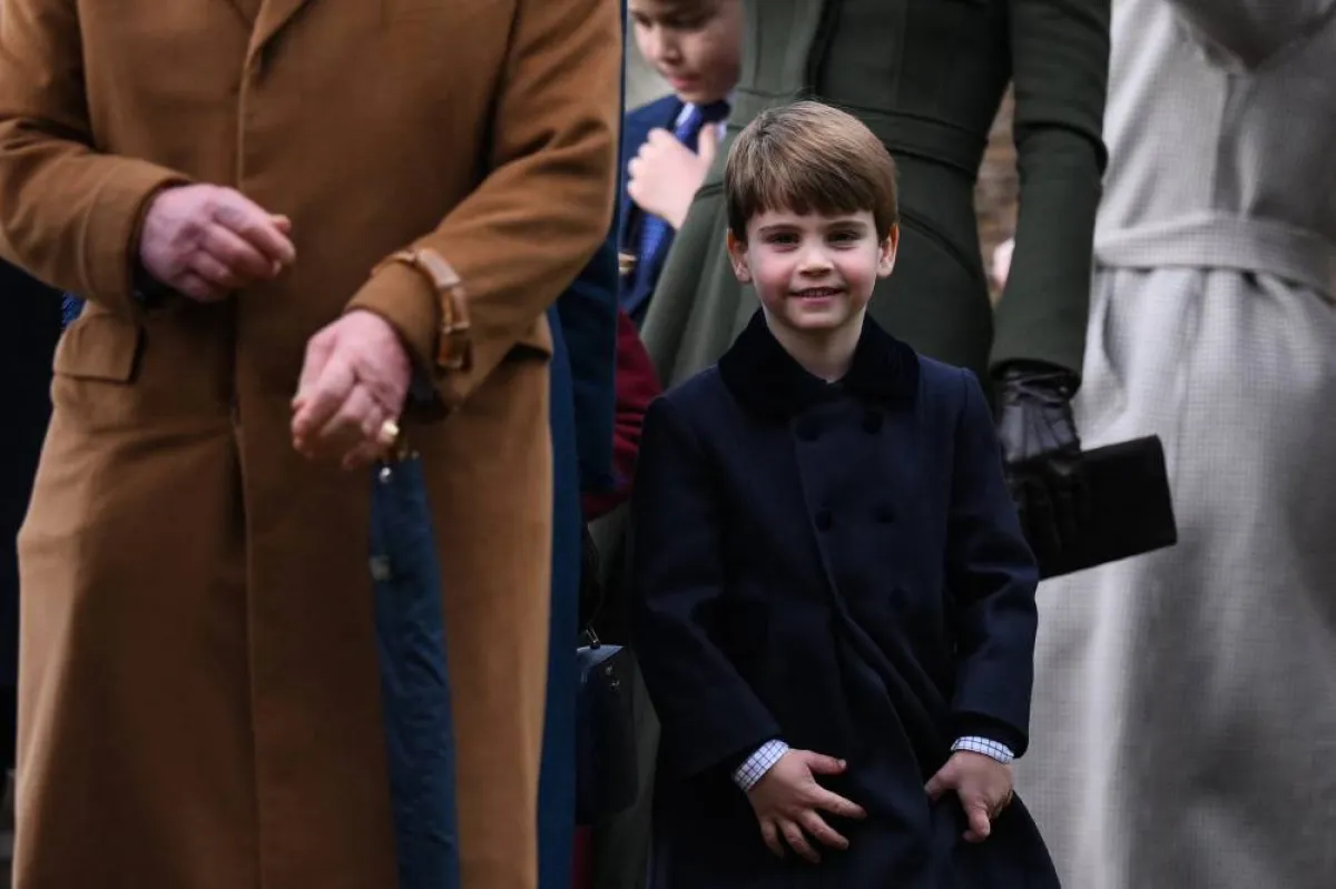 Britain's Prince Louis of Wales (C) leaves after the Royal Family's traditional Christmas Day service at St Mary Magdalene Church in Sandringham, Norfolk, eastern England, on December 25, 2022. Daniel LEAL / AFP