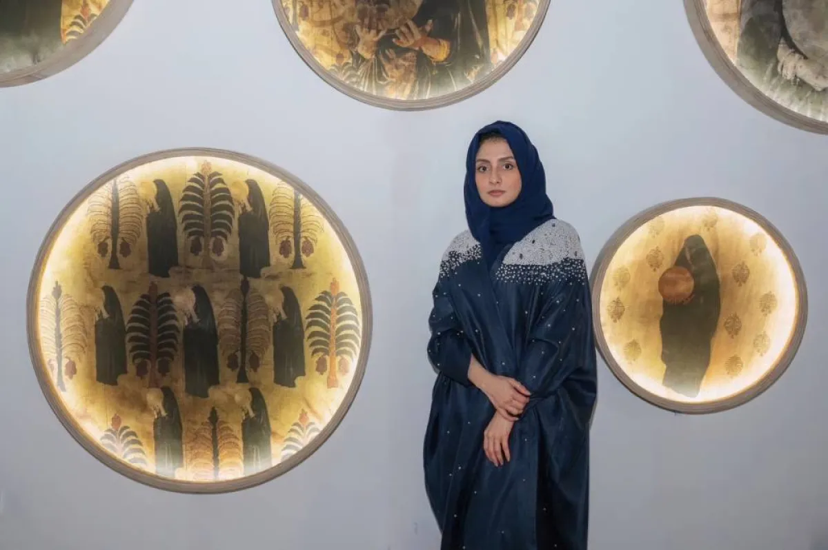 فاطمة النمر بجانب عملها - الصورة من حسابها على الانستجرام 