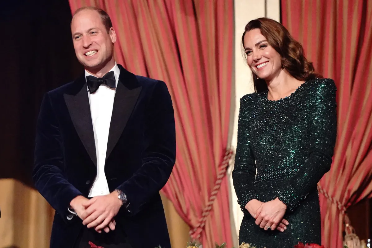 Britain's Prince William, Duke of Cambridge (L) and Britain's Catherine, Duchess of Cambridge (R) smile after watching the Royal Variety Performance at the Royal Albert Hall in London on November 18, 2021. The Royal Variety Performance takes place every year, in aid of the Royal Variety Charity, of which Her Majesty The Queen is Patron. The money raised from the show helps hundreds of entertainers throughout the UK, who need help and assistance as a result of old age, ill-health, or hard times. Jonathan Bra