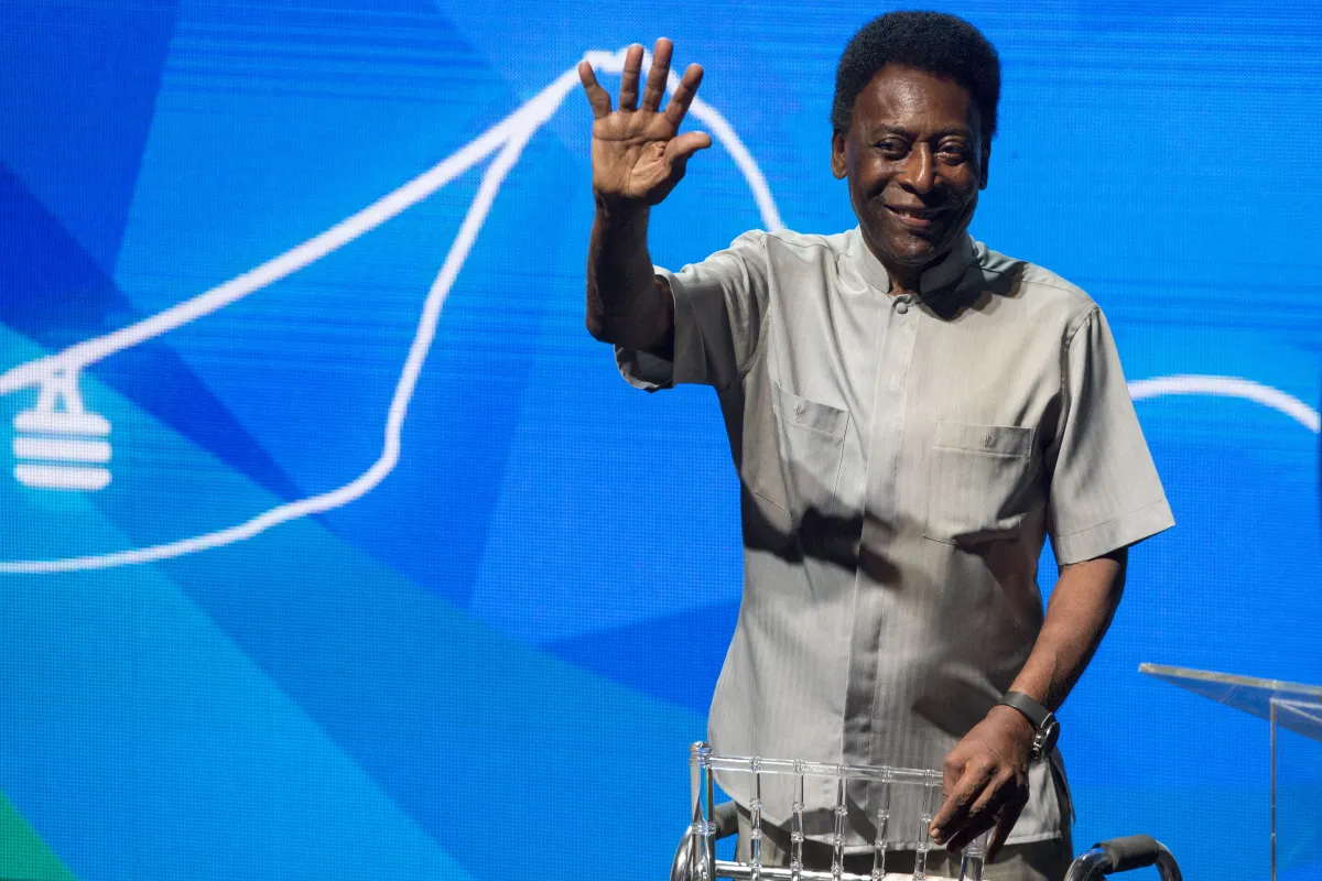 Legendary Brazilian footballer Pele, uses a walking frame as he greets supporters, during the opening event of the 2018 Carioca Football Championship at Cidade das Artes in Rio de Janeiro, Brazil, on January 15, 2018. Pele was named ambassador of the Championship. MAURO PIMENTEL / AFP