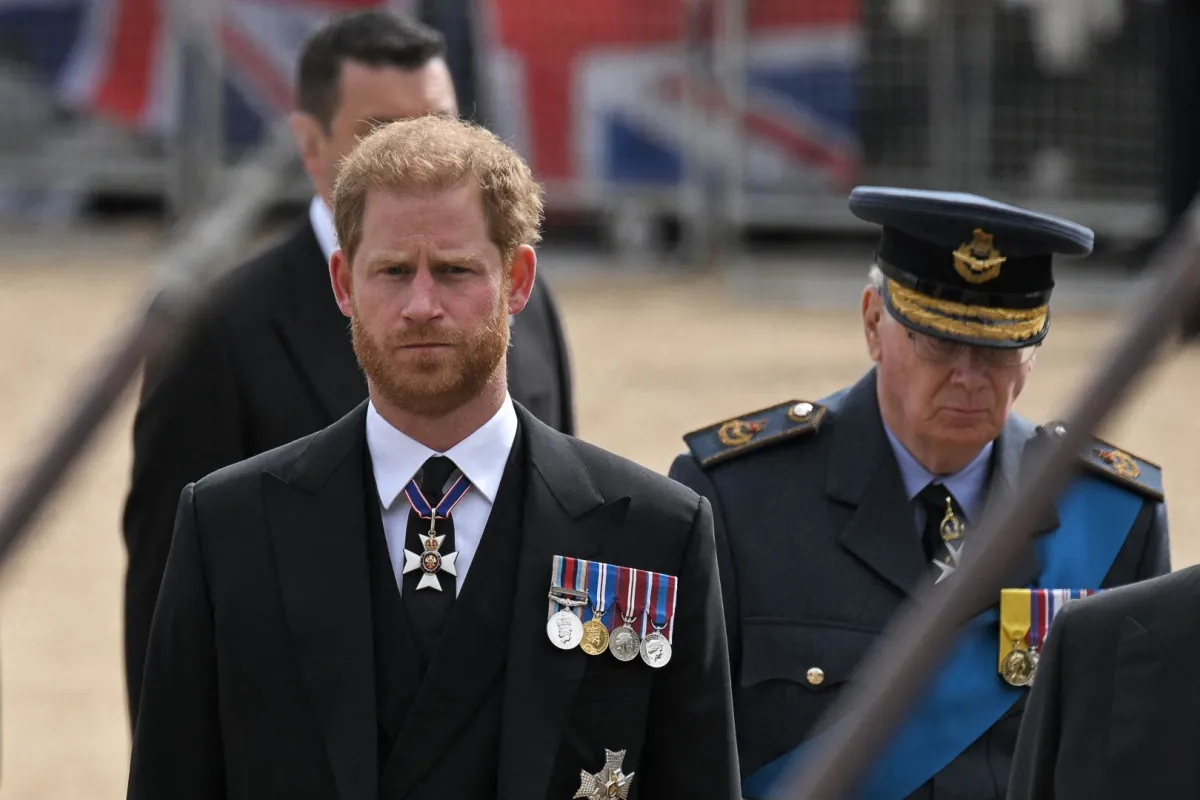 Britain's Prince Harry, Duke of Sussex follows the coffin of Queen Elizabeth II, on September 19, 2022, after the State Funeral Service of Britain's Queen Elizabeth II. LOIC VENANCE / AFP