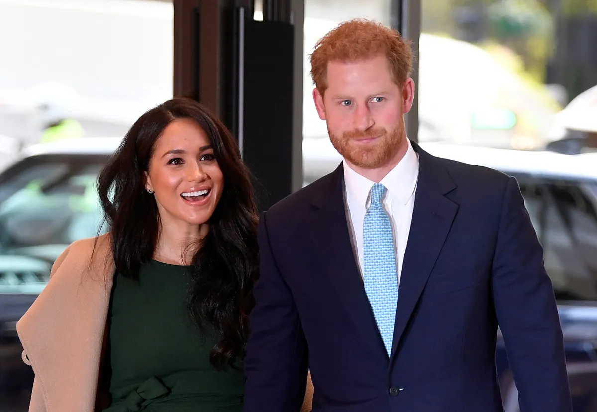Britain's Prince Harry, Duke of Sussex (R), and his wife Meghan, Duchess of Sussex attend the annual WellChild Awards in London on October 15, 2019. TOBY MELVILLE / POOL / AFP
