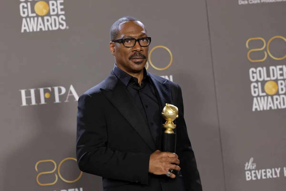 Eddie Murphy poses with the Cecil B. Demille Award in the press room during the 80th Annual Golden Globe Awards at The Beverly Hilton on January 10, 2023 in Beverly Hills, California. Amy Sussman/Getty Images/AFP