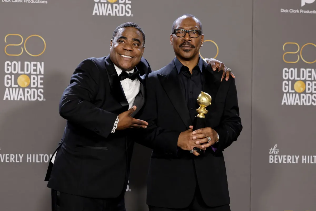 (L-R) Tracy Morgan poses with Eddie Murphy, winner of the Cecil B. Demille Award, in the press room during the 80th Annual Golden Globe Awards at The Beverly Hilton on January 10, 2023 in Beverly Hills, California. Amy Sussman/Getty Images/AFP