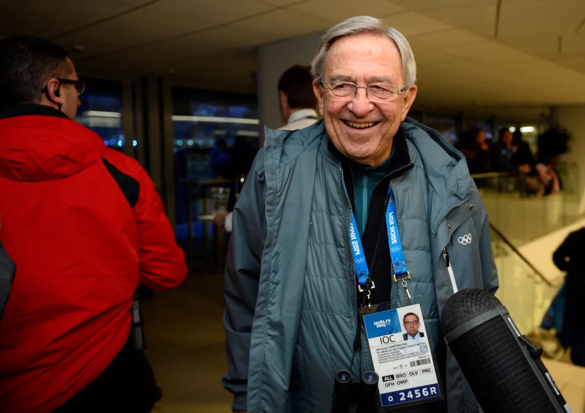 King Constantine of Greece smiles on arrival for the opening ceremony of the 2014 Winter Olympics on February 7, 2014, in Sochi. AFP PHOTO/ POOL / LIONEL BONAVENTURE Lionel BONAVENTURE / POOL / AFP