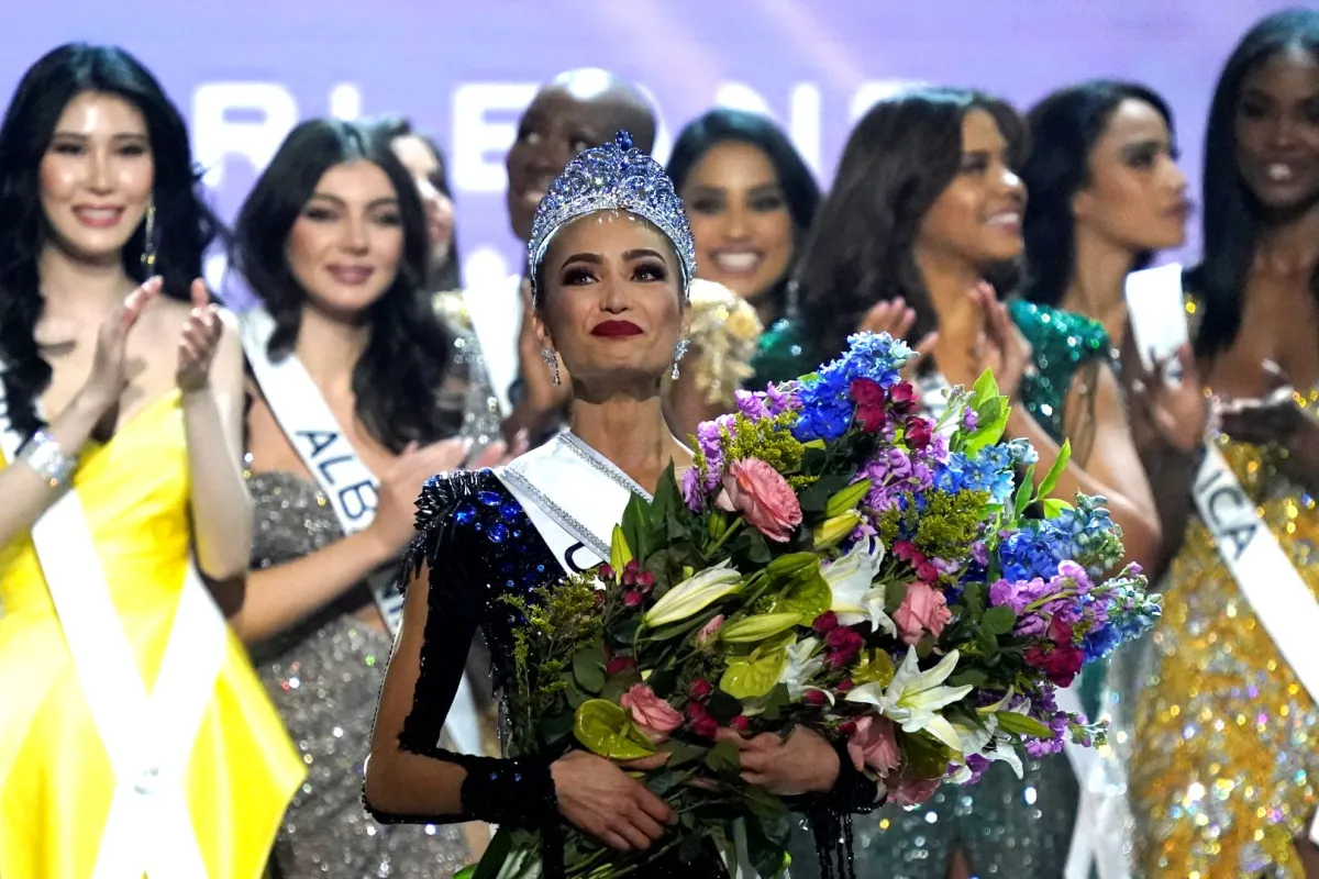 Miss USA R'Bonney Gabriel (C) celebrates after winning the 71st Miss Universe competition at the New Orleans Ernest N. Morial Convention Center in New Orleans, Louisiana on January 14, 2023. TIMOTHY A. CLARY / AFP