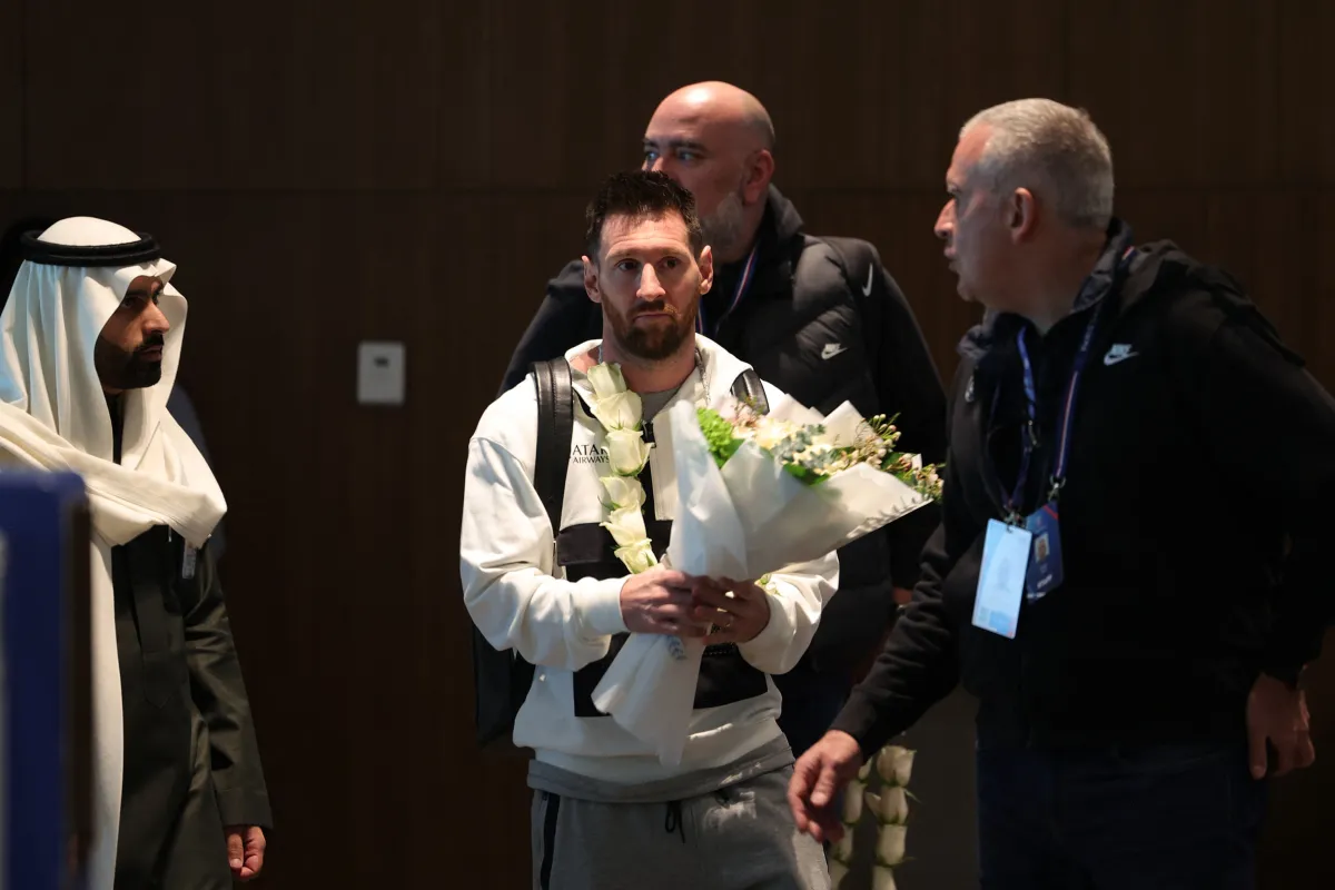 Paris Saint-Germain's Lionel Messi and members of the PSG team arrive at an airport in the Saudi capital Riyadh, on January 19, 2023, Fayez Nureldine / AFP