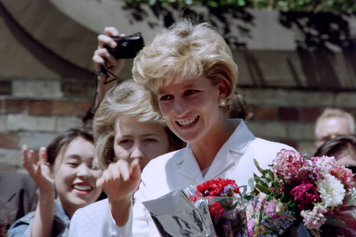 Diana, Princess of Wales, smiles as she meets wellwishers outside St Vincent's Hospice in Sydney on November 2, 1996, her last official engagement in Australia. Torsten BLACKWOOD / AFP