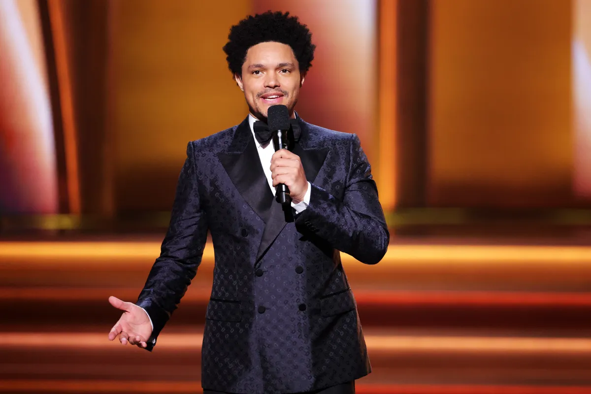  Host Trevor Noah speaks onstage during the 64th Annual GRAMMY Awards at MGM Grand Garden Arena on April 03, 2022 in Las Vegas, Nevada. Rich Fury/Getty Images for The Recording Academy/AFP Rich Fury / GETTY IMAGES NORTH AMERICA / Getty Images via AFP