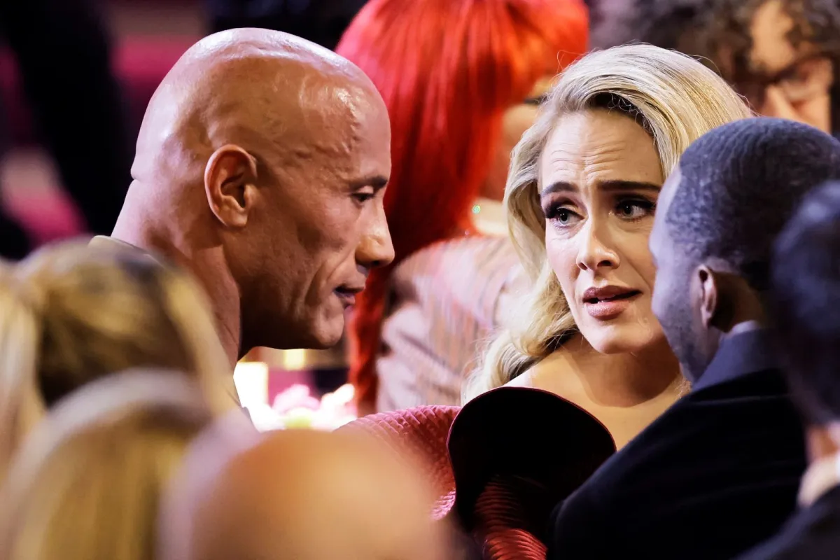 Dwayne Johnson and Adele at Crypto.com Arena on February 05, 2023 in Los Angeles, California. Kevin Winter/Getty Images for The Recording Academy /AFP