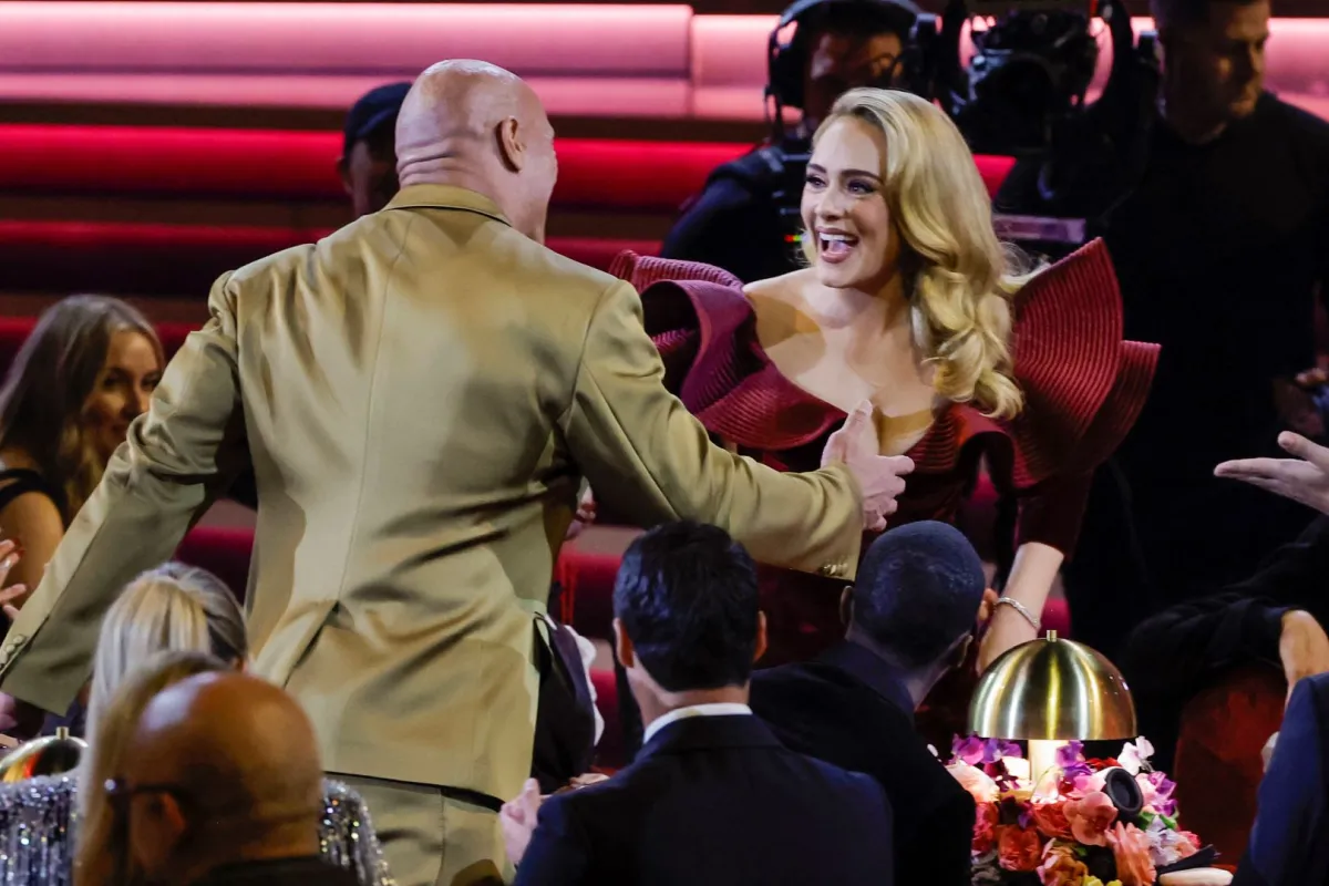 Dwayne Johnson and Adele at Crypto.com Arena on February 05, 2023 in Los Angeles, California. Kevin Winter/Getty Images for The Recording Academy /AFP