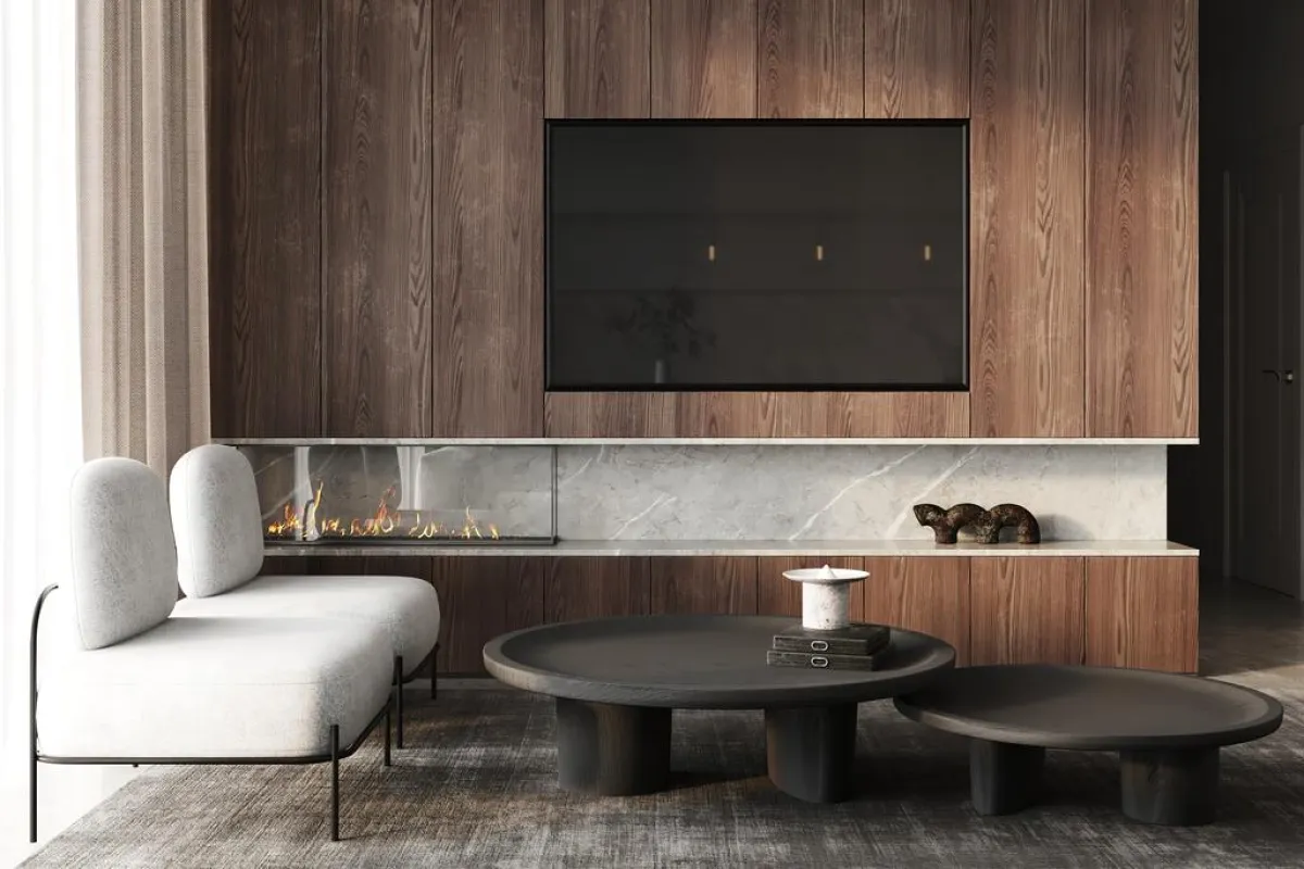 تصميم يدمج الرخام بالخشب، في الجدار الذي يحمل التلفزيون