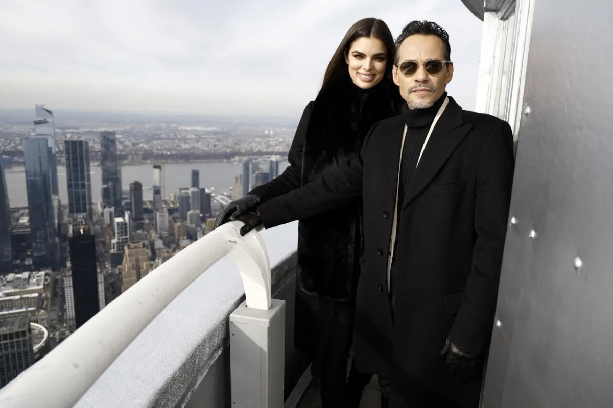 Nadia Ferreira and Marc Anthony visit the Empire State Building on December 05, 2022 in New York City. John Lamparski/Getty Images for Empire State Realty Trust/AFP