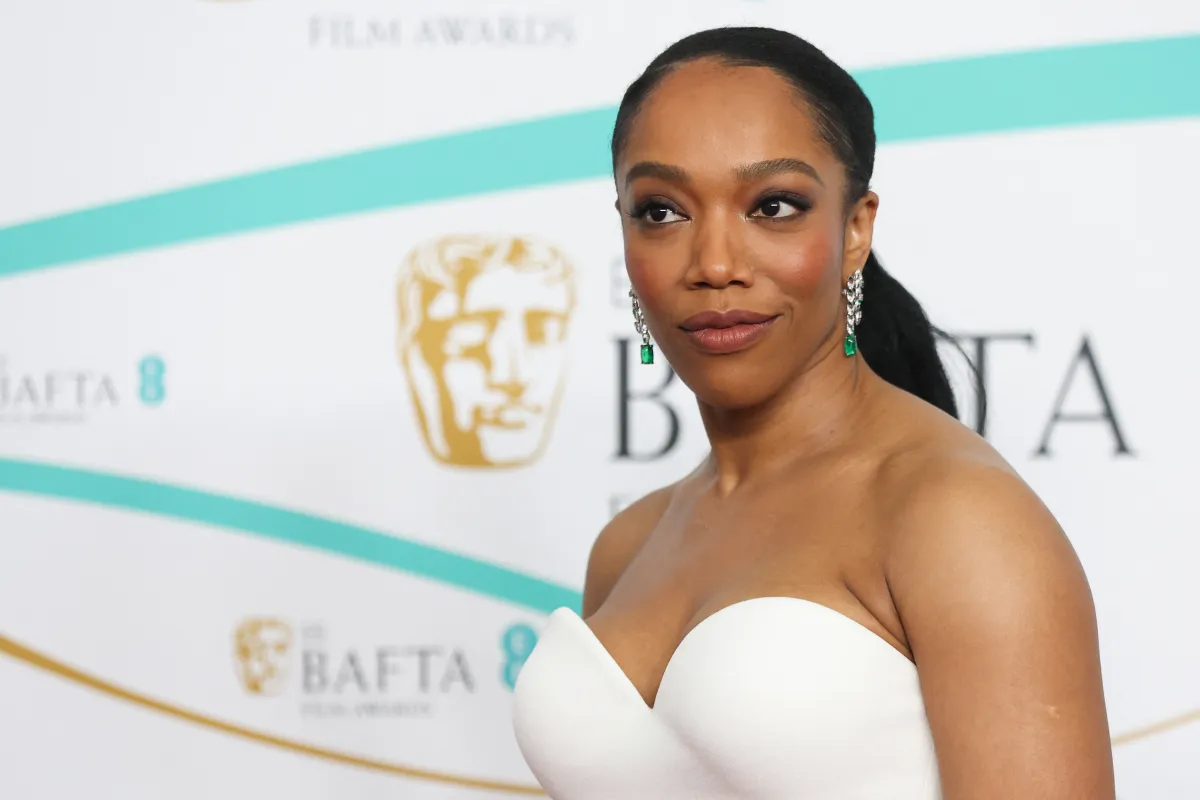 British actress Naomi Ackie poses on the red carpet upon arrival at the BAFTA British Academy Film Awards at the Royal Festival Hall, Southbank Centrer, in London, on February 19, 2023. ISABEL INFANTES / AFP