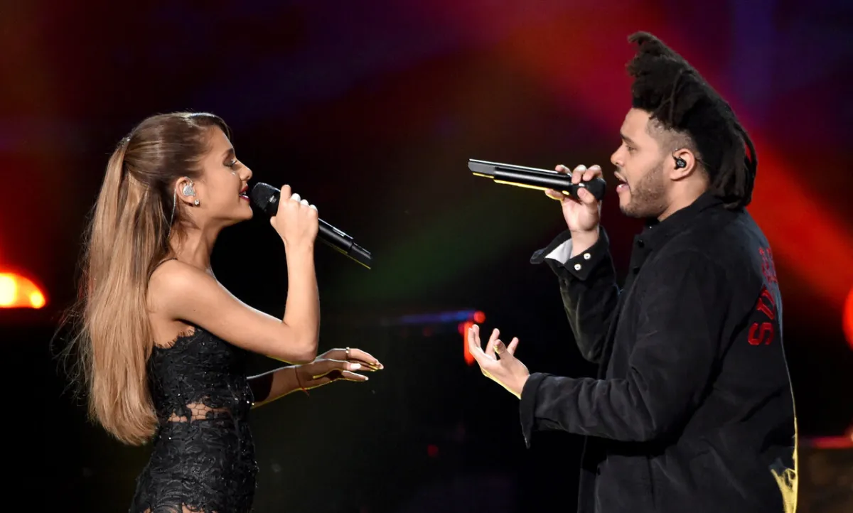 Ariana Grande and The Weeknd perform onstage at the 2014 American Music Awards at Nokia Theatre L.A. Live on November 23, 2014 in Los Angeles, California. Kevin Winter/Getty Images/AFP