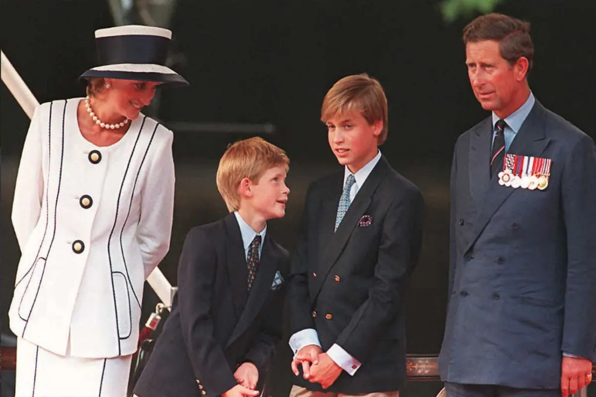 Princess Diana, her sons Harry and William, and Prince Charles as part of the commemorations of VJ Day 19 August in London.  AFP PHOTO. Johnny EGGITT / AFP