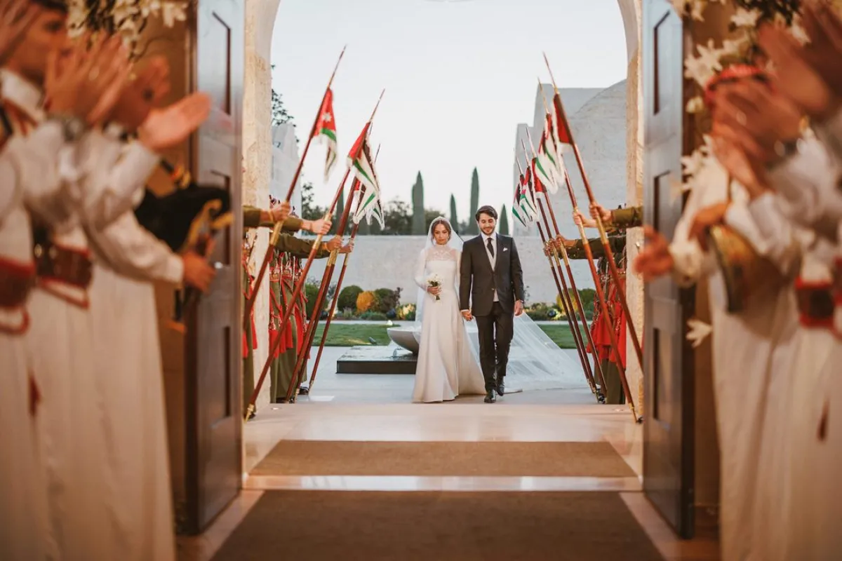 A handout picture released by Jordan's Royal Palace shows the wedding ceremony of the Jordanian monarch's eldest daughter Princess Iman and Jameel Alexander Thermiotis in Amman on March 12, 2023. Thermiotis, who was born in 1994 in Venezuela to a family of Greek origin, currently works in the field of finance in New York.  AFP PHOTO / JORDANIAN ROYAL PALACE